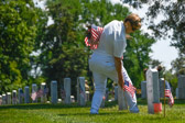 Gold Star Mother Patti Elliott helped in the placing of flags at the headstone of our fallen heroes.
